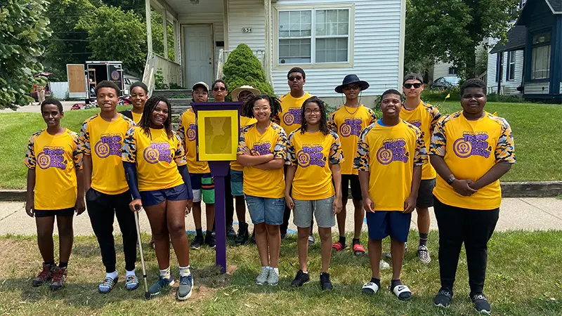 The Tipping Point Crew With Little Library